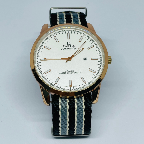 White analog dial with black hour markers and silver watch case