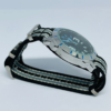 Black dial wristwatch with silver case and NATO nylon strap