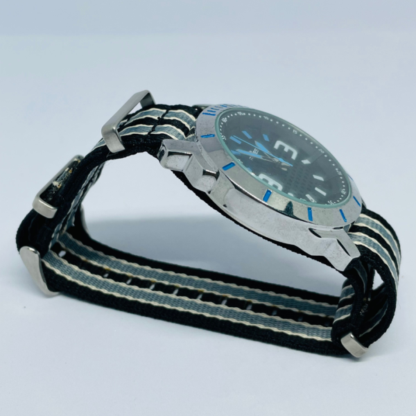 Black dial wristwatch with silver case and NATO nylon strap