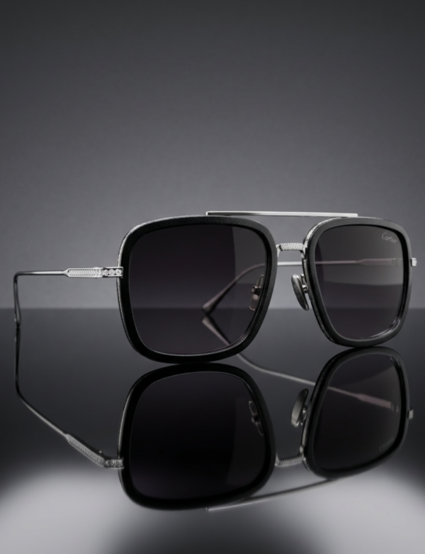 Luxury sunglasses with reflective lenses on minimal background