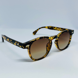 Trendy men’s round sunglasses outdoors