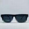 Black aviator sunglasses with metal frame and dark lenses