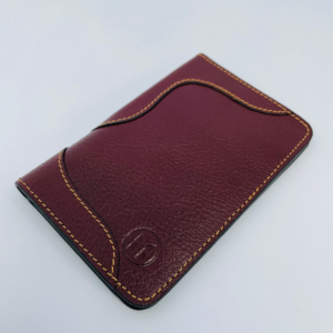 Maroon leather wallet with gold stitching