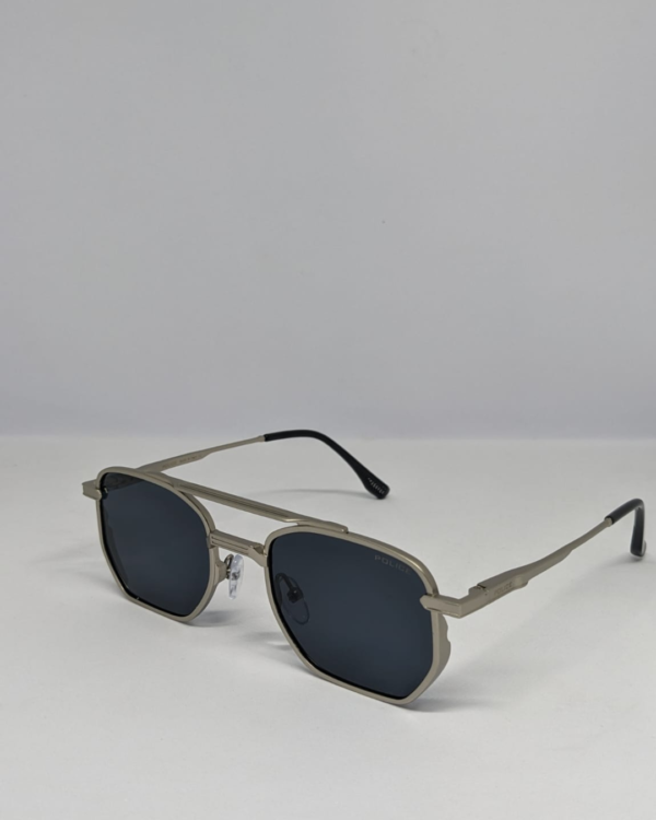 Close-up of double bridge design on square aviator sunglasses