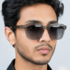 MIGNON FB Model wearing square frame grey sunglasses, outdoor casual look