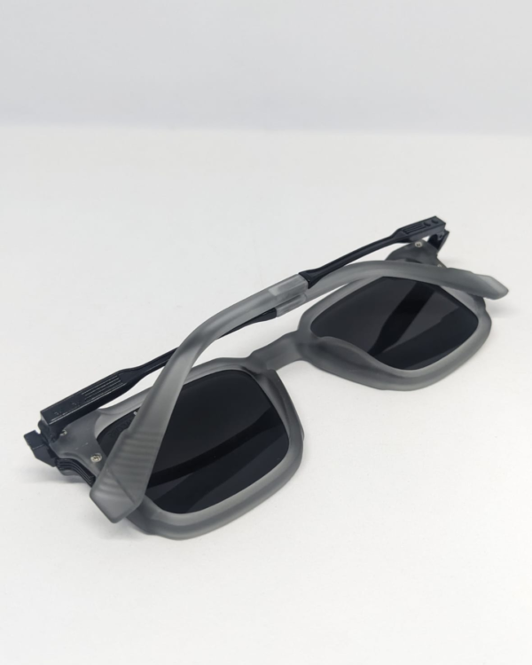 Square matte grey sunglasses with protective case and cloth