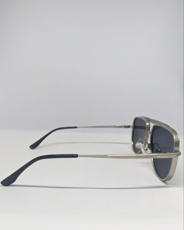 MIGNON FB (3) Man wearing aviator sunglasses with silver frame outdoor style
