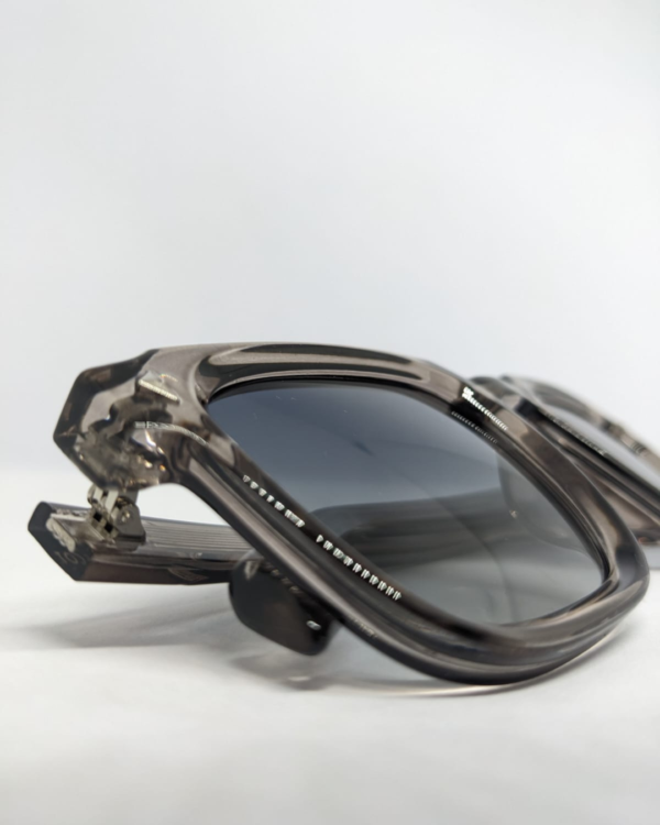 MIGNON FB (4) Side angle of smoky grey polycarbonate sunglasses frame