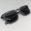Square frame matte grey sunglasses with dark charcoal lens front view