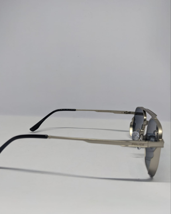 Close-up of silver metal temple arm on aviator sunglasses