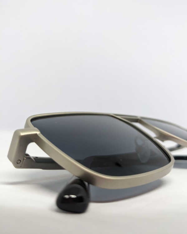 MIGNON FB (6) Close-up of smoke black flat tinted lens on navigator sunglasses