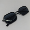 Untitled design(3) Close-up of dark grey lens on octagonal aluminium sunglasses