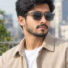 mignon (18) Model wearing square frame grey sunglasses, outdoor casual look